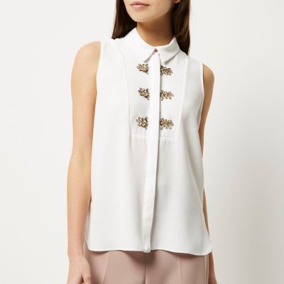 White embellished sleeveless blouse